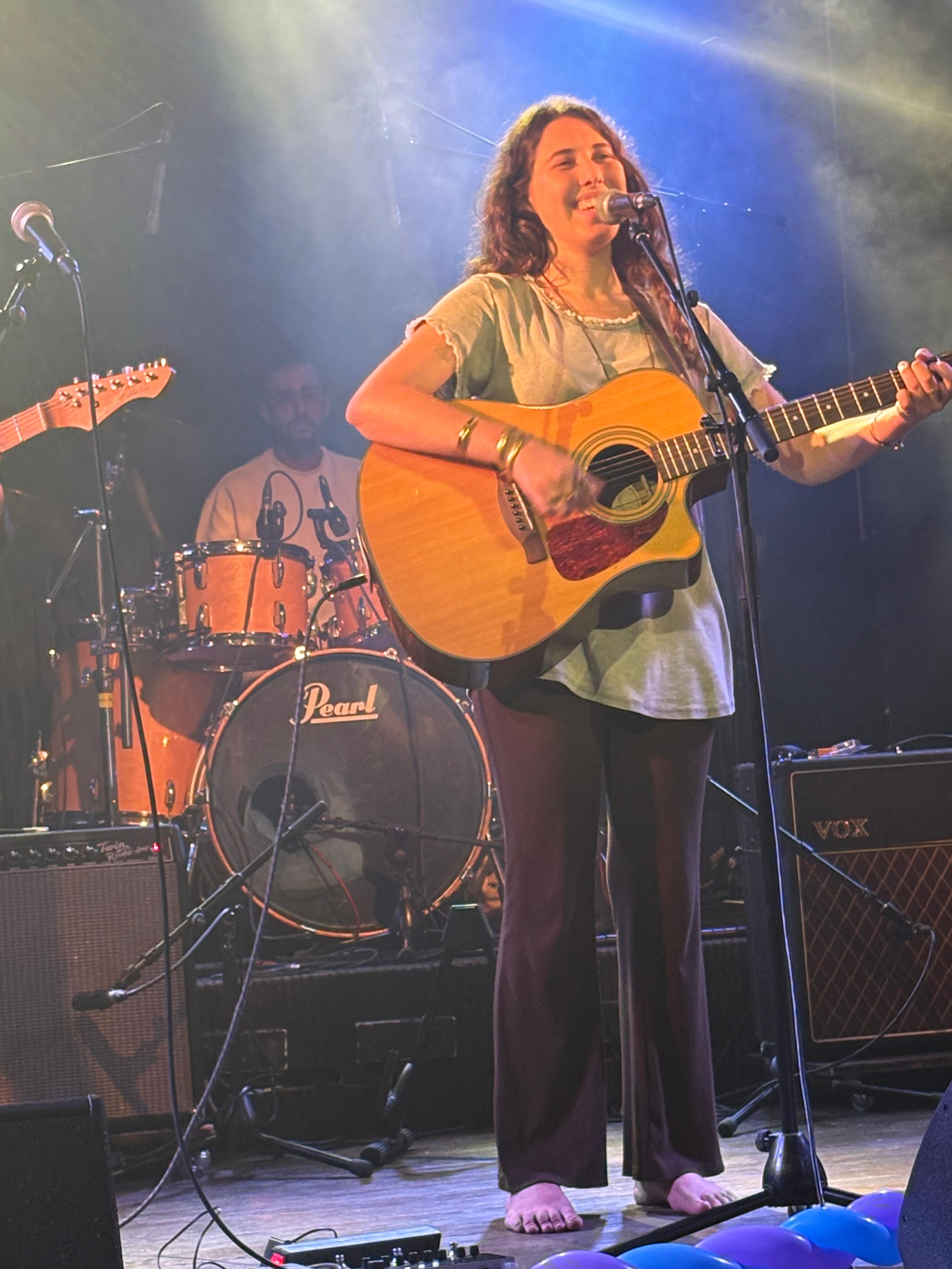 Hodaya performing on stage